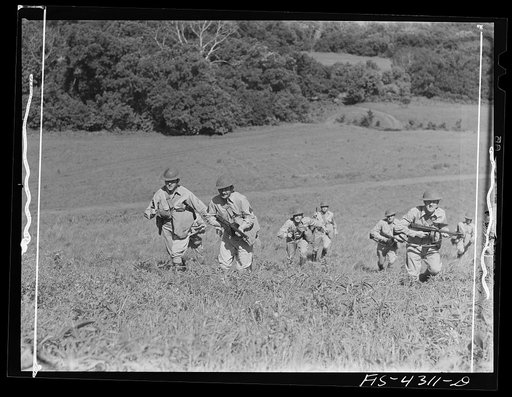 Fort Riley, Kansas. A reconnaissance unit attacking a hill during a sham battle