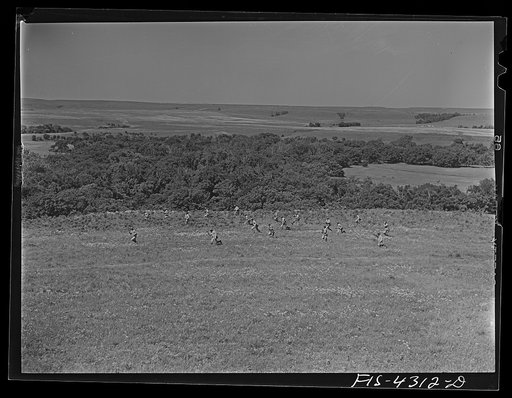 Fort Riley, Kansas. A reconnaissance unit attacking a hill during a sham battle