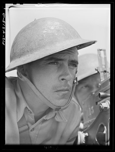 Fort Riley, Kansas. Sergeant commanding a scout car of a mechanized cavalry reconnaissance unit