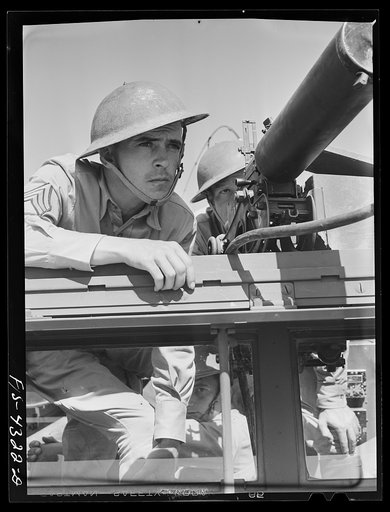 Fort Riley, Kansas. Sergeant commanding a scout car of a mechanized cavalry reconnaissance unit