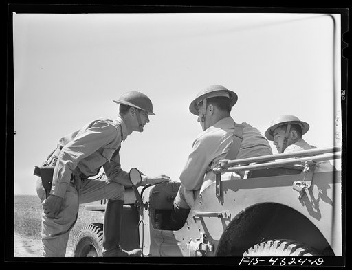 Untitled photo, possibly related to: Fort Riley, Kansas. Giving orders during a sham battle