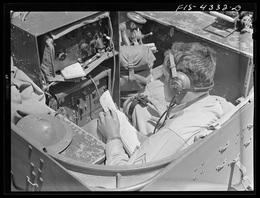 Fort Riley, Kansas. Sending a radio message from a scout car during a sham battle