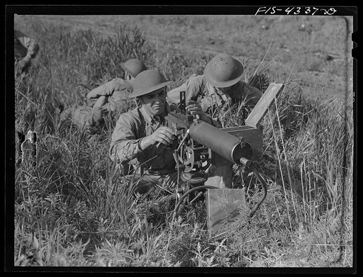 Fort Riley, Kansas. Setting up a machine gun during a sham battle