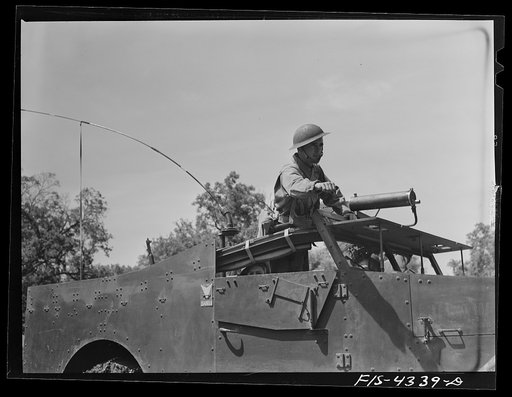 Untitled photo, possibly related to: Fort Riley, Kansas. During a field problem of a mechanized cavalry reconnaissance unit