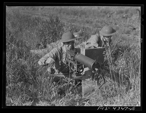 Untitled photo, possibly related to: Fort Riley, Kansas. During a field problem of a mechanized cavalry reconnaissance unit