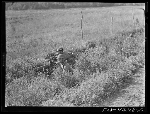Untitled photo, possibly related to: Fort Riley, Kansas. During a field problem of a mechanized cavalry reconnaissance unit