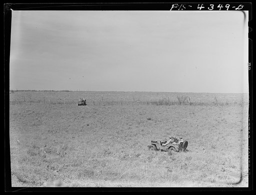 Untitled photo, possibly related to: Fort Riley, Kansas. Jeeps going down a steep grade during a training demonstration