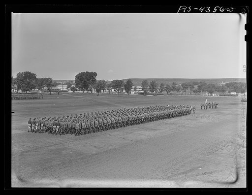 Untitled photo, possibly related to: Camp Funston, Kansas. Dismounted review for General Millikan
