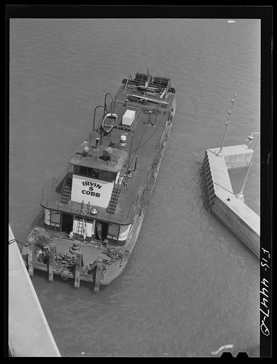 Wheeler Dam, Alabama (Tennessee Valley Authority (TVA)). Tugboat from Paducah, Kentucky in lock at Wheeler Dam, Alabama