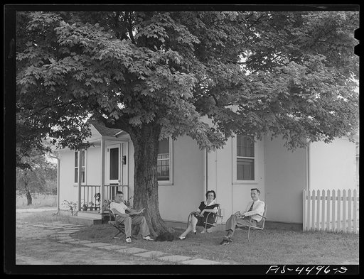 Florence, Alabama (Tennessee Valley Authority (TVA)). Gordon Williams, electrician at Wilson Dam, lives in this demountable prefabricated defense house at Florence, Alabama