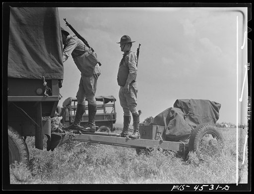 Fort Riley, Kansas. Field artillery moving back to camp after a day of artillery practice