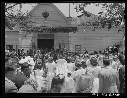 Untitled photo, possibly related to: Crowd in front of the Sociedade do Espirito Santo (SES) hall during the Holy Ghost fiesta. Santa Clara, California