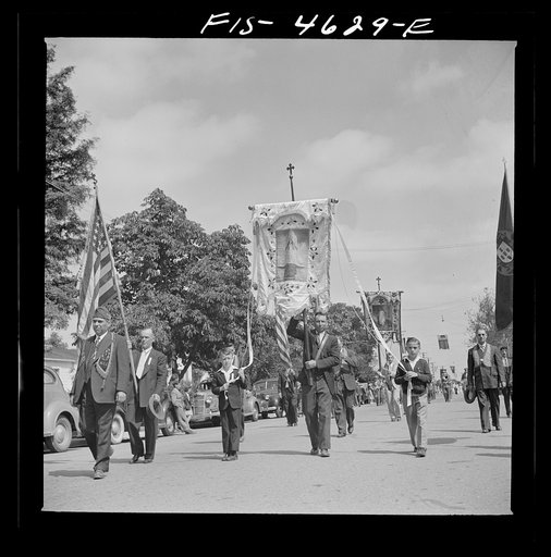Banners and flags in the parade of the fiesta of the Holy Ghost. Santa Clara, California