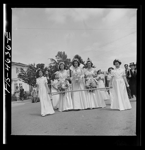 Untitled photo, possibly related to: Queen and her court in the parade of the fiesta of the Holy Ghost. Santa Clara, California