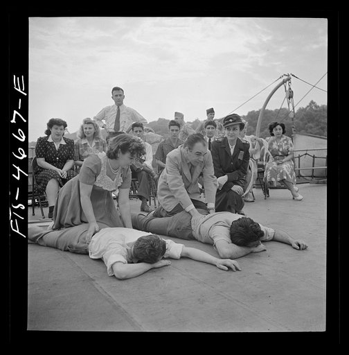 Untitled photo, possibly related to: Washington, D.C. First aid class held daily by the Red Cross aboard a Potomac riverboat which carries workers to Port Washington every morning. They are civilian employees of the U.S. Army adjutant general's office
