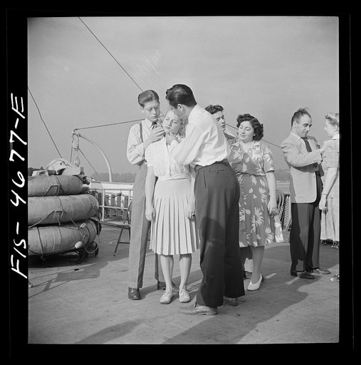Washington, D.C. Applying pressure to pressure point as part of a course in first aid, aboard a Potomac River boat