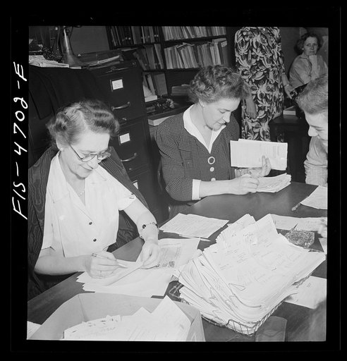 Washington, D.C. Stack of untranslated messages in the middle of the table at the Red Cross Foreign Inquiry Service