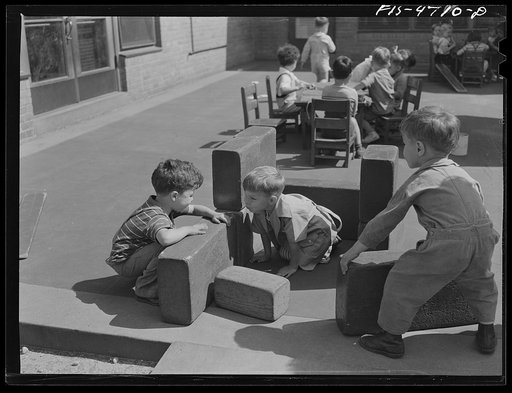 Queens, New York. Nursery school at the Queensbridge housing project. Children playing with blocks