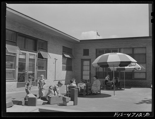 Queens, New York. Nursery school at the Queesbridge housing project. Outdoor playground