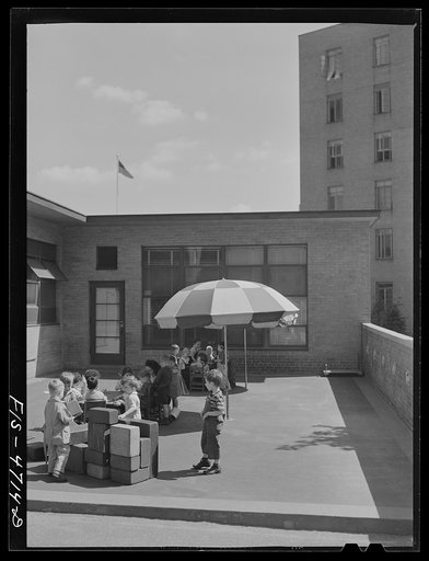 Untitled photo, possibly related to: Queens, New York. Nursery school at the Queensbridge housing project. Outdoor playground