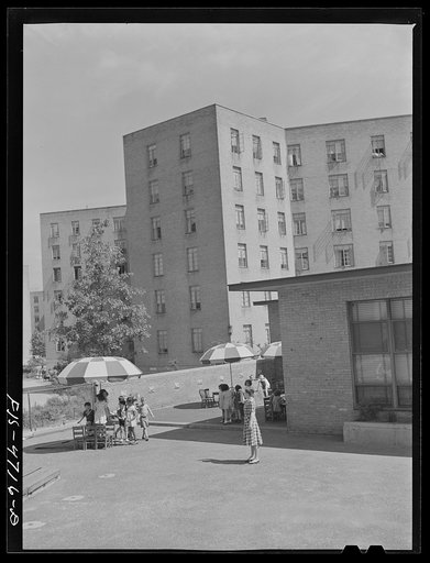 Queens, New York. Nursery school at the Queensbridge housing project. Outdoor playground