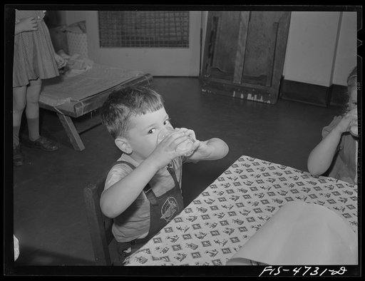 Untitled photo, possibly related to: Queens, New York. Nursery school at the Queensbridge housing project. Drinking milk