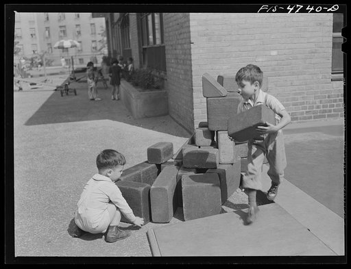 Untitled photo, possibly related to: Queens, New York. Playing with blocks at the nursery school at Queensbridge housing project
