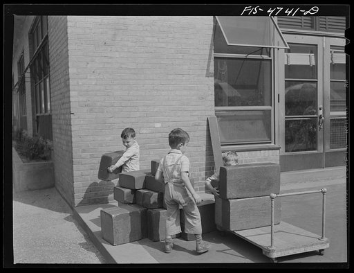 Untitled photo, possibly related to: Queens, New York. Playing with blocks at the nursery school at Queensbridge housing project