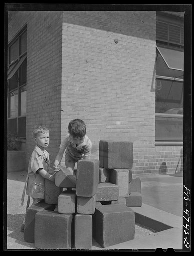 Queens, New York. Playing with blocks at the nursery school at Queensbridge housing project