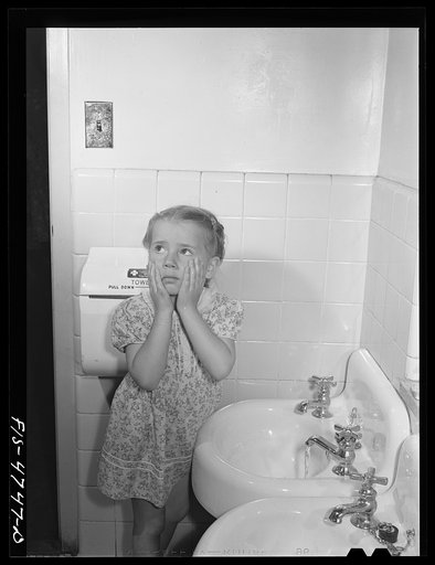 Untitled photo, possibly related to: Queens, New York. Nursery school at the Queensbridge housing project. Child washing before lunch
