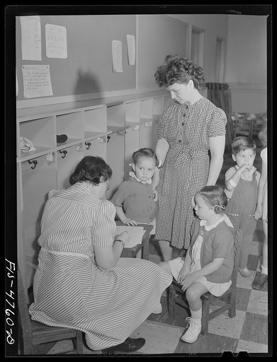 Queens, New York. Nursery school at the Queensbridge housing project. Parents bring their children to the nursery in the morning