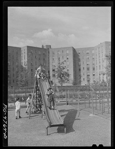 Queens, New York. Nursery school at the Queensbridge housing project. Outdoor playground
