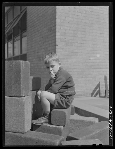 Untitled photo, possibly related to: Queens, New York. Child with blocks at the nursery school at Queensbridge housing project