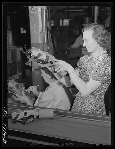 Edgewood Arsenal, Maryland. Gas demonstration. Inspecting reconditioned gas masks at the gas mask factory