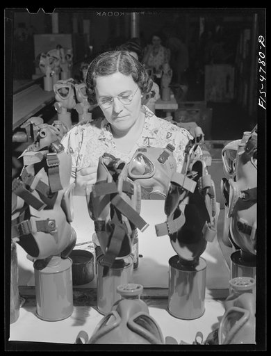 Edgewood Arsenal, Maryland. Gas demonstration. Reconditioning gas masks for civilian defense use at the gas mask factory