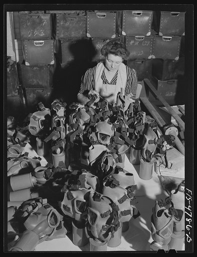 Edgewood Arsenal, Maryland. Gas demonstration. Reconditioning gas masks for civilian defense use at the gas mask factory