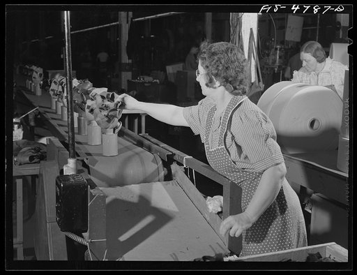 Edgewood Arsenal, Maryland. Gas demonstration. Reconditioned gas masks on the conveyor belt at the gas mask factory