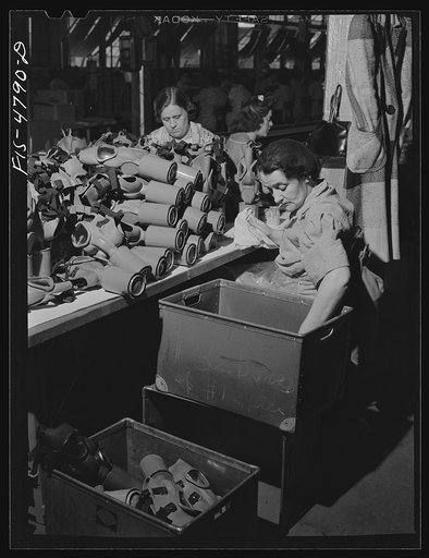 Edgewood Arsenal, Maryland. Gas demonstration. Reconditioning gas masks for civilian defense use at the gas mask factory
