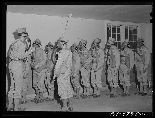 Edgewood Arsenal, Maryland. Gas demonstration. Soldiers in gas chamber filled with tear gas