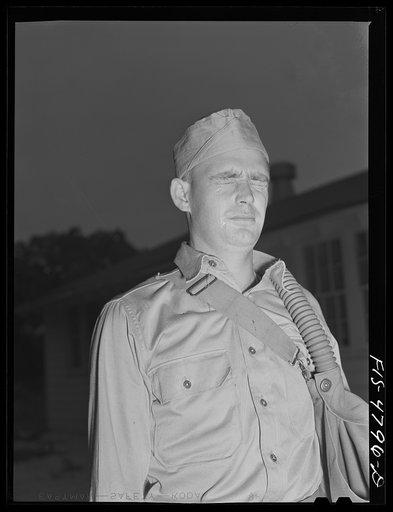 Edgewood Arsenal, Maryland. Gas demonstration. Soldier who has just come out of the gas chamber filled with tear gas after having been in there several seconds without a gas mask