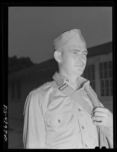 Untitled photo, possibly related to: Edgewood Arsenal, Maryland. Gas demonstration. Soldier who has just come out of the gas chamber filled with tear gas after having been in there several seconds without a gas mask