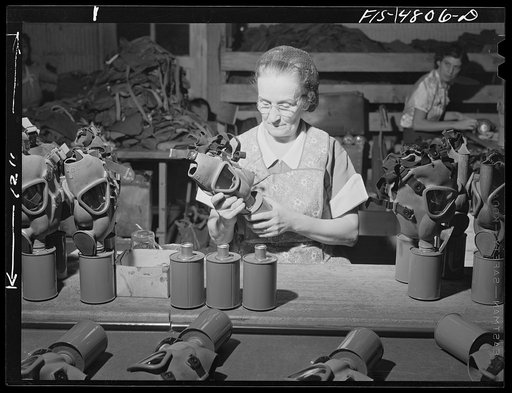 Edgewood Arsenal, Maryland. Gas demonstration. Working on reconditioned gas masks for civilian defense use at the gas mask factory