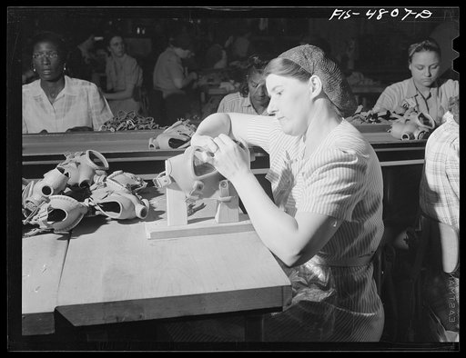 Edgewood Arsenal, Maryland. Gas demonstration. Working on reconditioned gas masks for civilian defense use at the gas mask factory