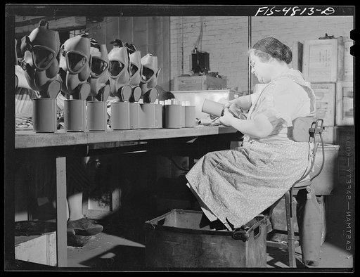 Edgewood Arsenal, Maryland. Gas demonstration. Working on reconditioned gas masks for civilian defense use at the gas mask factory