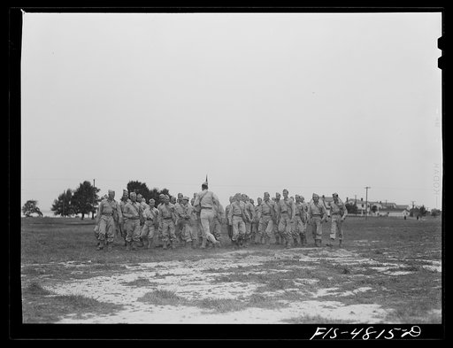 Edgewood Arsenal, Maryland. Gas demonstration. Soldiers running through a cloud of phosgene gas in order to learn its identity by odor