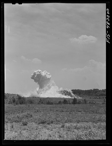 Untitled photo, possibly related to: Edgewood Arsenal, Maryland. Gas demonstration. Exploding aerial bomb just dropped by a plane