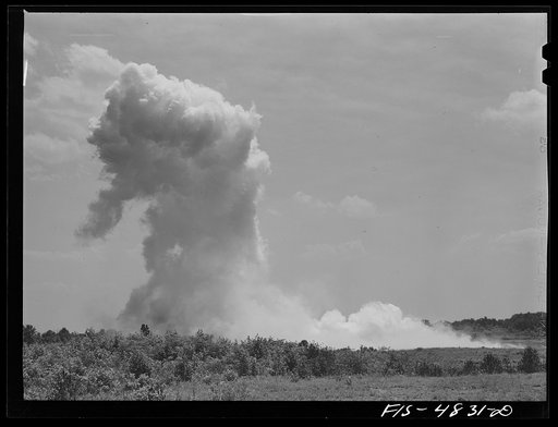 Untitled photo, possibly related to: Edgewood Arsenal, Maryland. Gas demonstration. Exploding aerial bomb just dropped by a plane