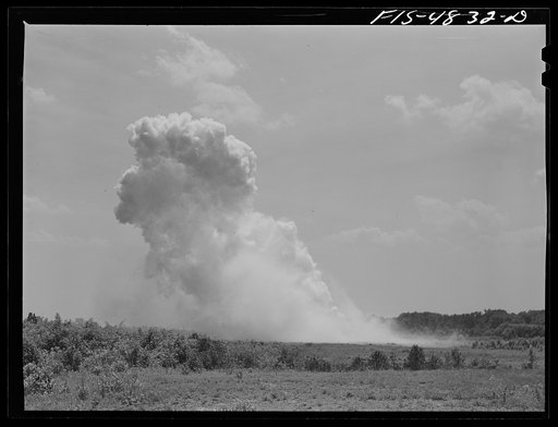 Edgewood Arsenal, Maryland. Gas demonstration. Exploding aerial bomb just dropped by a plane