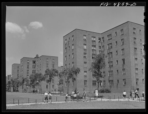 Brooklyn, New York. Red Hook housing development. Every group of buildings is surrounded by trees and grass with a courtyard where children can play