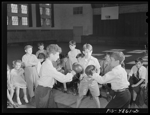 Brooklyn, New York. Red Hook Housing development. Boxing match in the gymnasium of the community center